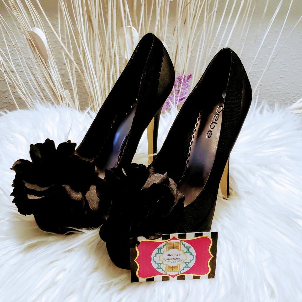 Bebe black platform pom stilettos heels size 6💞